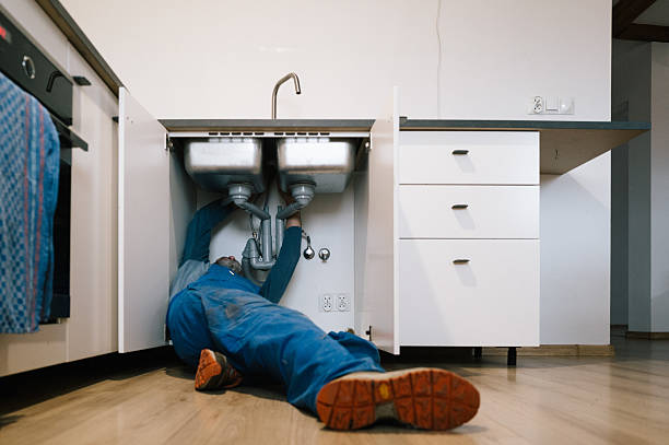 Professional Drain Cleaning technician working in Marietta, IL